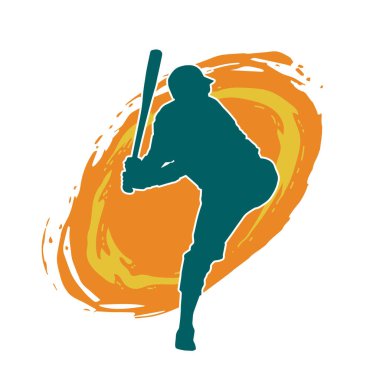 Hareketli bir erkek beyzbol oyuncusunun silueti. Vurucu olarak beyzbol oynayan bir adamın silueti..
