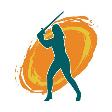 Bir kadın dövüşçünün silueti kılıç taşırken poz veriyor..