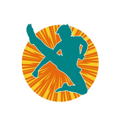 Dövüş sanatları pozu veren bir erkeğin silueti. Dövüş sanatları ustasının silueti tekme atma pozu veriyor..