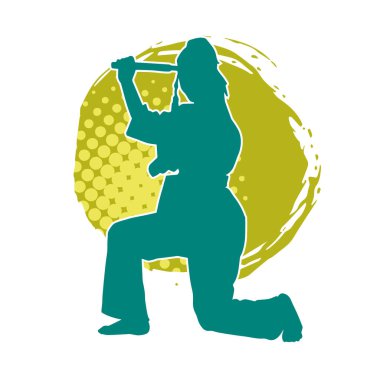 Dövüş sanatları yapan zayıf bir kadının silueti. Dövüş sanatlarında çalışan bir kadının silueti..