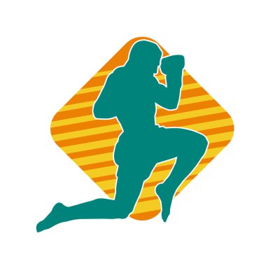 Hareketli erkek kickboksör atletinin silueti. Tekme atan bir adamın silueti..