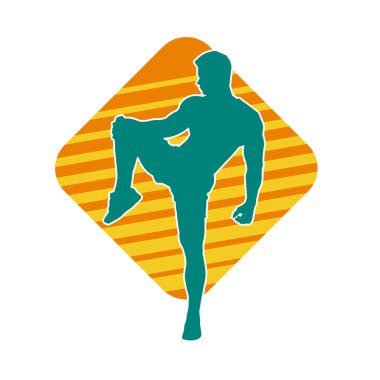 Sportif bir erkeğin silueti spor salonunda poz veriyor. Aerobik yapan zayıf bir adamın silueti..