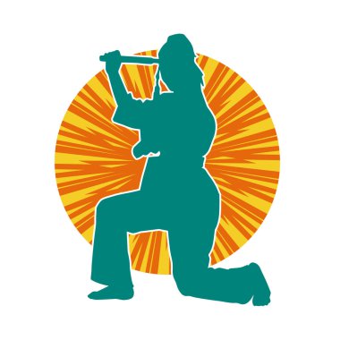 Dövüş sanatları yapan zayıf bir kadının silueti. Dövüş sanatlarında çalışan bir kadının silueti..