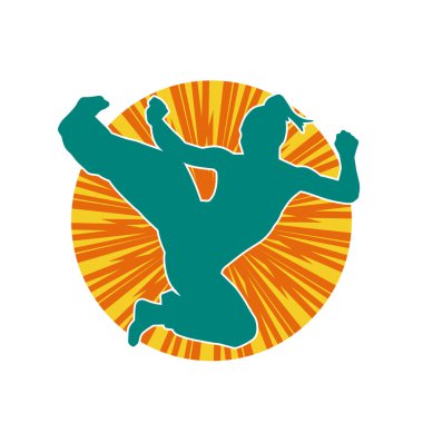 Dövüş sanatları tekmesi atan bir kadının silueti. Sportif bir kadının silueti tekme hareketi yapıyor..