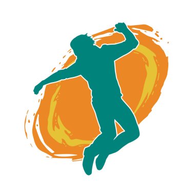 Poz veren bir erkek dansçının silueti. Dans eden bir adamın silueti.