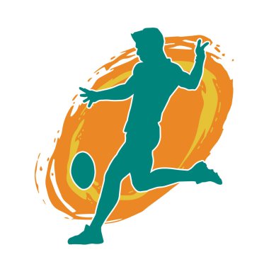 Rugby sporcusunun silueti iş başında. Rugby oynayan sporcu bir adamın silueti..