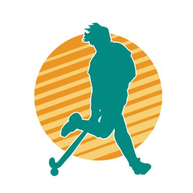 Çim hokeyi oynayan kadın atlet silueti. Çim hokeyi oynayan bir kadının silueti..