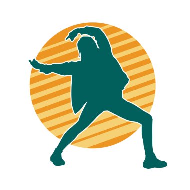 Hareketli bir kadın dansçının silueti. Dans eden zayıf bir kadının silueti..