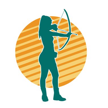 Dişi okçu bir dövüşçünün silueti ok ve yayla pozisyonunu alıyor..