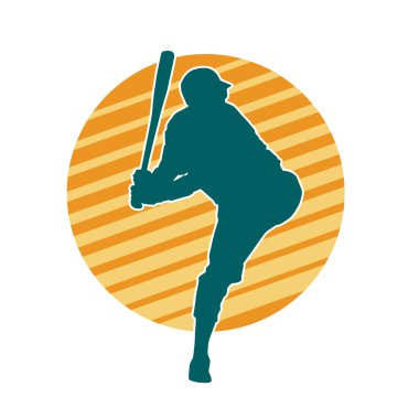 Hareketli bir erkek beyzbol oyuncusunun silueti. Vurucu olarak beyzbol oynayan bir adamın silueti..