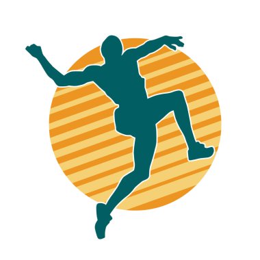 Zıplayan bir adamın silueti. Sıradan bir erkeğin silueti..