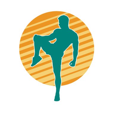 Sportif bir erkeğin silueti spor salonunda poz veriyor. Aerobik yapan zayıf bir adamın silueti..