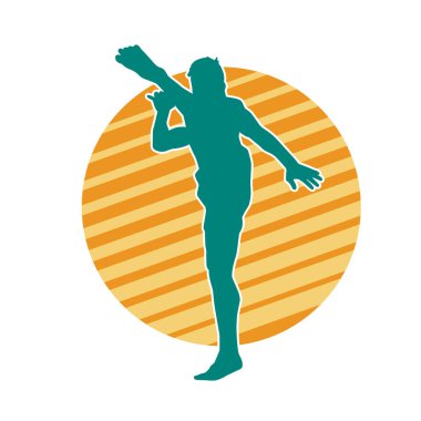 Dövüş sanatları pozu veren bir erkeğin silueti. Dövüş sanatları ustasının silueti tekme atma pozu veriyor..