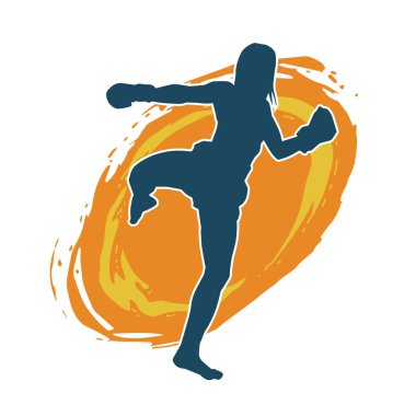 Hareketli kadın kickboksör atletinin silueti. Tekme atan bir kadının silueti..