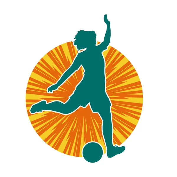 Topa vuran bayan futbolcunun silueti. Hareketli bir futbolcu kadının silueti..