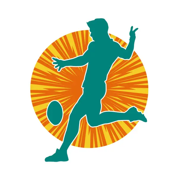 Rugby sporcusunun silueti iş başında. Rugby oynayan sporcu bir adamın silueti..