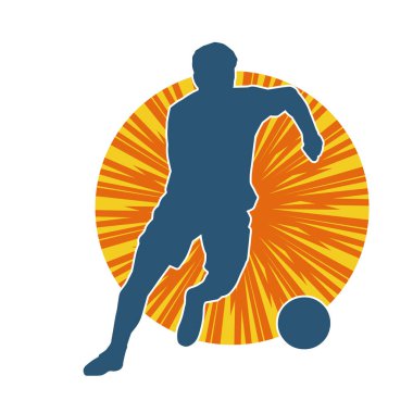 Top tekmeleyen bir erkek futbolcunun silueti. Hareket halindeki bir futbolcunun silueti.