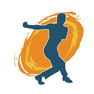 Doğu dövüş sanatı pozu veren bir adamın silueti. Dövüş sanatlarında bir erkeğin silueti..