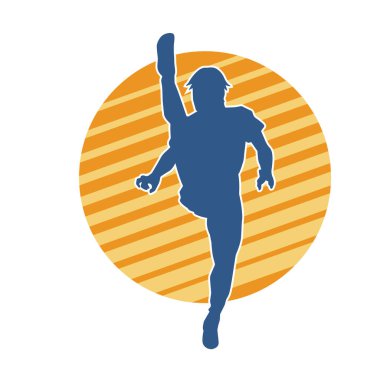 Dövüş sanatları pozu veren bir erkeğin silueti. Dövüş sanatları ustasının silueti tekme atma pozu veriyor..