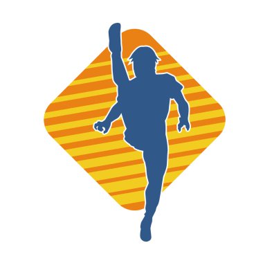 Dövüş sanatları pozu veren bir erkeğin silueti. Dövüş sanatları ustasının silueti tekme atma pozu veriyor..