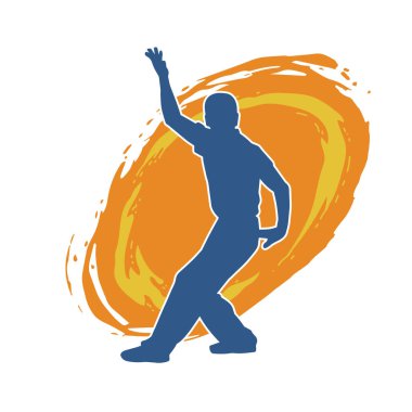 Doğu dövüş sanatı pozu veren bir adamın silueti. Dövüş sanatlarında bir erkeğin silueti..