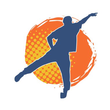 Hareket halindeki bir erkek dansçının silueti. Dans eden zayıf bir adamın silueti..