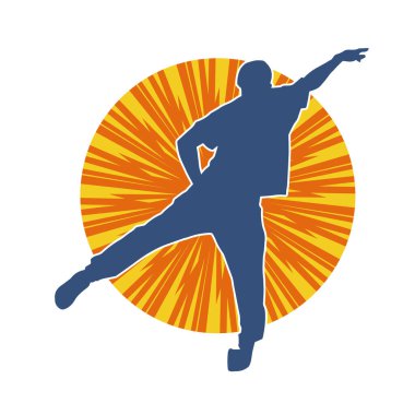 Hareket halindeki bir erkek dansçının silueti. Dans eden zayıf bir adamın silueti..