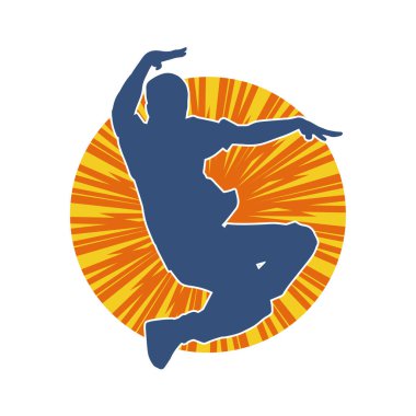 Hareket halindeki bir erkek dansçının silueti. Dans eden zayıf bir adamın silueti..