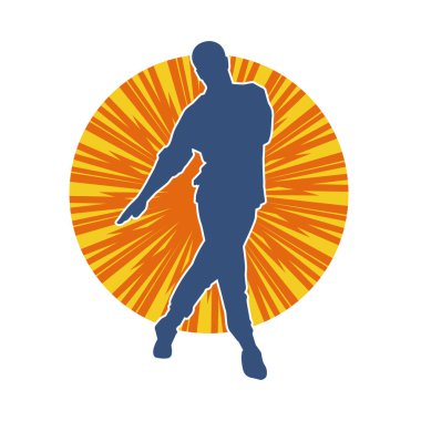 Hareket halindeki bir erkek dansçının silueti. Dans eden zayıf bir adamın silueti..