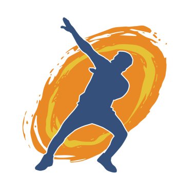 Hareket halindeki bir erkek dansçının silueti. Dans eden zayıf bir adamın silueti..