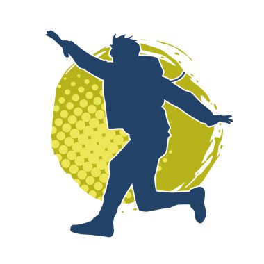 Hareket halindeki bir erkek dansçının silueti. Dans eden zayıf bir adamın silueti..