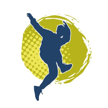 Hareket halindeki bir erkek dansçının silueti. Dans eden zayıf bir adamın silueti..