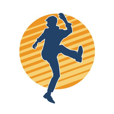 Hareket halindeki bir erkek dansçının silueti. Dans eden zayıf bir adamın silueti..