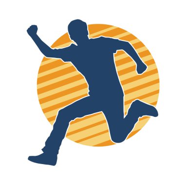 Hareket halindeki bir erkek dansçının silueti. Dans eden zayıf bir adamın silueti..