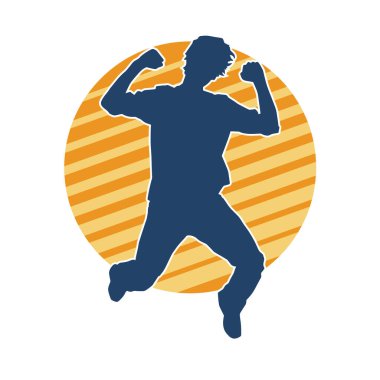 Hareket halindeki bir erkek dansçının silueti. Dans eden zayıf bir adamın silueti..