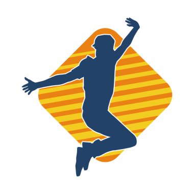 Hareket halindeki bir erkek dansçının silueti. Dans eden zayıf bir adamın silueti..