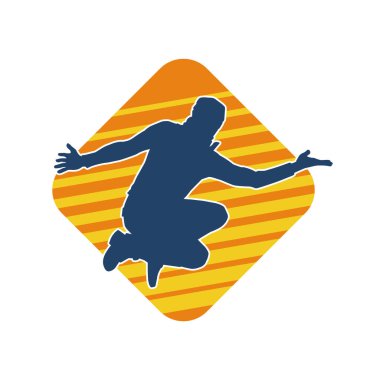 Zıplayan bir adamın silueti. Sıradan bir erkeğin silueti..