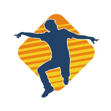 Hareket halindeki bir erkek dansçının silueti. Dans eden zayıf bir adamın silueti..