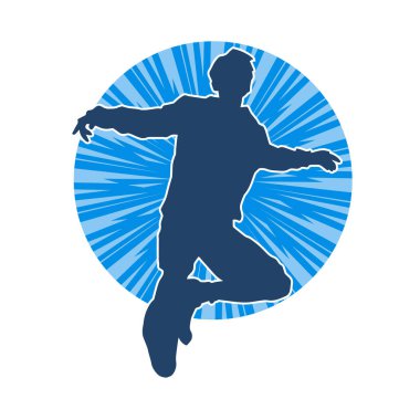 Hareket halindeki bir erkek dansçının silueti. Dans eden zayıf bir adamın silueti..