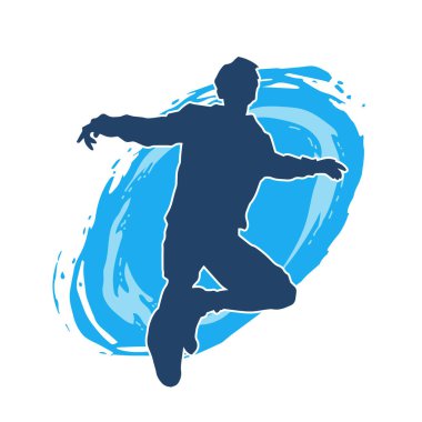 Hareket halindeki bir erkek dansçının silueti. Dans eden zayıf bir adamın silueti..