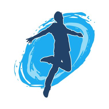 Hareket halindeki bir erkek dansçının silueti. Dans eden zayıf bir adamın silueti..