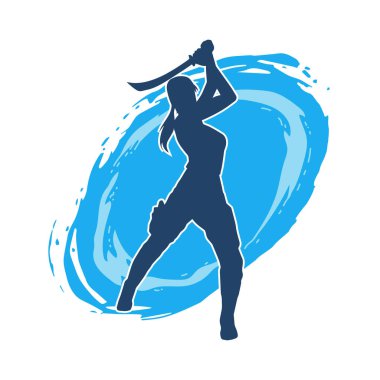 Bir kadın dövüşçünün silueti kılıç taşırken poz veriyor..