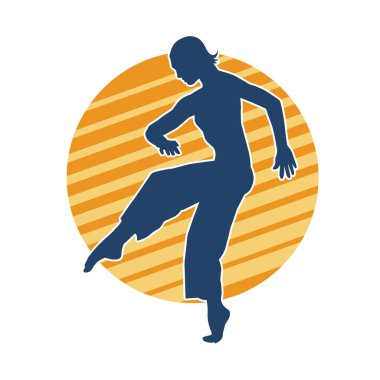 Hareketli bir kadın balerin silueti. Dans eden balerin kızın silueti..