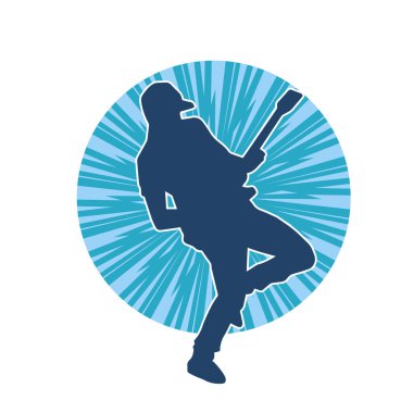 Elektro gitar çalan bir müzisyenin silueti. Bir erkek gitaristin silueti.