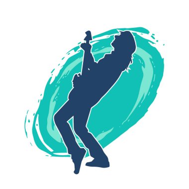 Elektro gitar çalan bir müzisyenin silueti. Bir erkek gitaristin silueti.