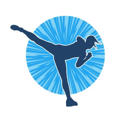 Dövüş sanatları tekmesi atan bir kadının silueti. Sportif bir kadının silueti tekme hareketi yapıyor..