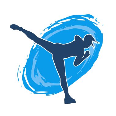 Dövüş sanatları tekmesi atan bir kadının silueti. Sportif bir kadının silueti tekme hareketi yapıyor..