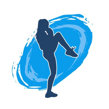 Hareketli kadın kickboksör atletinin silueti. Tekme atan bir kadının silueti..