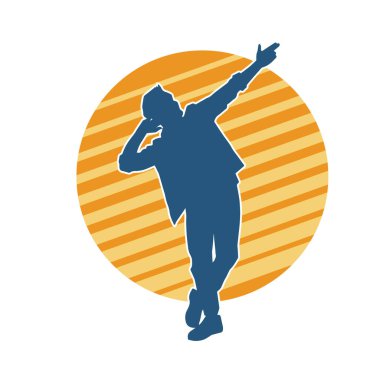 Dans eden bir adamın silueti. Erkek dansçı silueti poz veriyor..