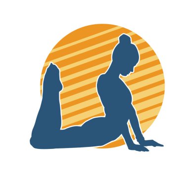 İnce bir balerin kadın silueti esniyor ya da ısınıyor..